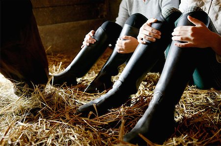 riding boots not equestrian not cowboy not child - Two people wearing riding boots Stock Photo - Premium Royalty-Free, Code: 614-00602812