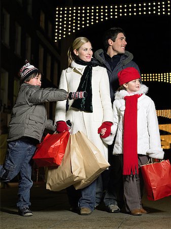 simsearch:846-05648541,k - Family out christmas shopping Stock Photo - Premium Royalty-Free, Code: 614-00892841