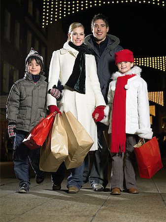 simsearch:846-05648541,k - Family out christmas shopping Stock Photo - Premium Royalty-Free, Code: 614-00892853