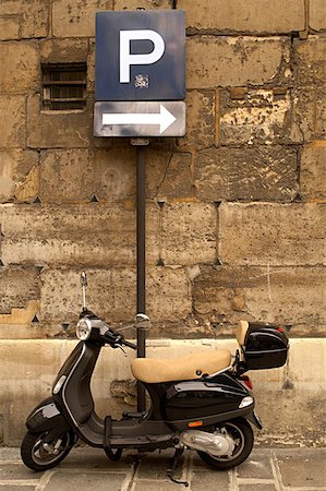 Moped on a paris street Stock Photo - Premium Royalty-Free, Code: 614-00966425