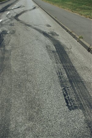 skid marks - Tyre tracks on a road Stock Photo - Premium Royalty-Free, Code: 614-00966486