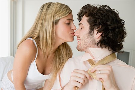 simsearch:614-06896801,k - Woman kissing man on nose Stock Photo - Premium Royalty-Free, Code: 614-01218915
