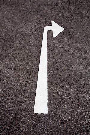 road painting image - Arrow sign Stock Photo - Premium Royalty-Free, Code: 614-01267991