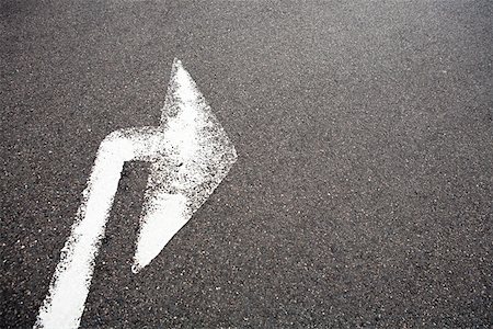 road painting image - Arrow sign Stock Photo - Premium Royalty-Free, Code: 614-01270153