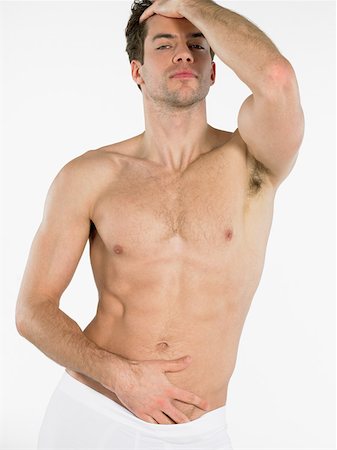 Sexy man posing Stock Photo - Premium Royalty-Free, Code: 614-01486509