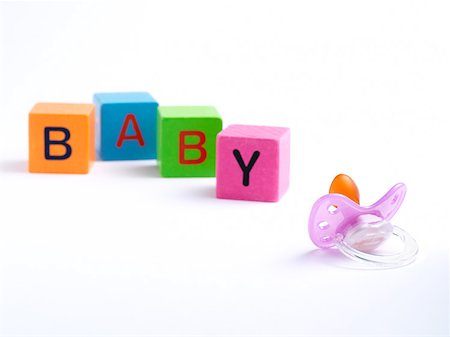 simsearch:614-05955760,k - Dummy and building blocks spelling baby Stock Photo - Premium Royalty-Free, Code: 614-01560439