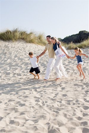 Family on beach Stock Photo - Premium Royalty-Free, Code: 614-01819972