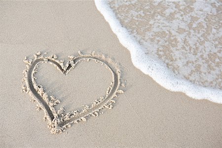 Heart shape in the sand Stock Photo - Premium Royalty-Free, Code: 614-02004153