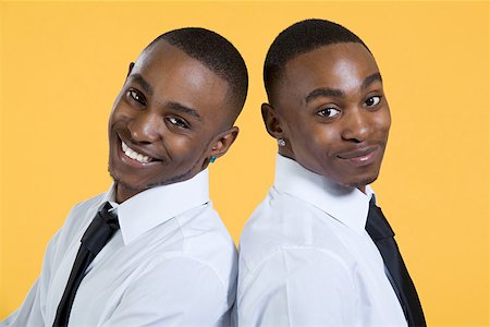 simsearch:614-06116419,k - Portrait of twin brothers Stock Photo - Premium Royalty-Free, Code: 614-02004556