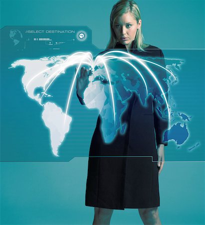 simsearch:614-02002647,k - Woman with world on screen Stock Photo - Premium Royalty-Free, Code: 614-02002651