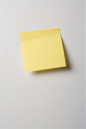 self adhesive note - Adhesive note on wall Stock Photo - Premium Royalty-Free, Code: 614-02048569