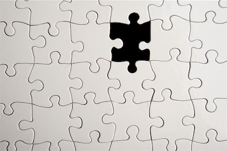 puzzle piece - Jigsaw puzzle with missing piece Stock Photo - Premium Royalty-Free, Code: 614-02048561