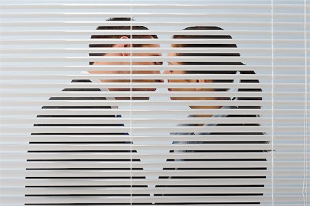 Office workers kissing Stock Photo - Premium Royalty-Free, Code: 614-02074062