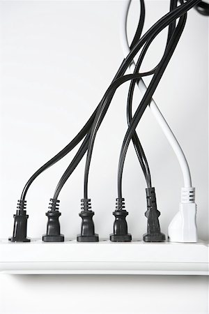 Electrical plugs in a extension cord Stock Photo - Premium Royalty-Free, Code: 614-02073837