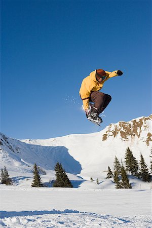 snowboarder (male) - A man snowboarding Stock Photo - Premium Royalty-Free, Code: 614-02244019