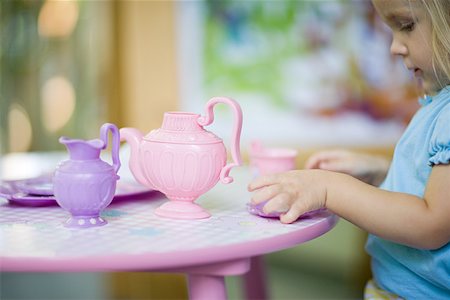 Girl having tea party Stock Photo - Premium Royalty-Free, Code: 614-02241488