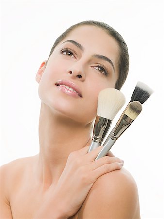 simsearch:649-07520416,k - Woman with make up brushes Stock Photo - Premium Royalty-Free, Code: 614-02241983