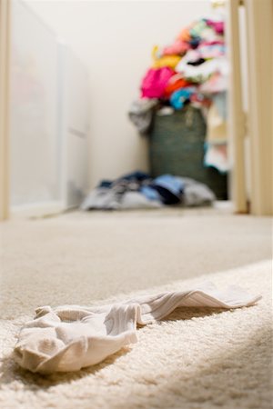 A sock on a floor Stock Photo - Premium Royalty-Free, Code: 614-02343112