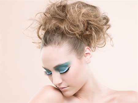 false eyelashes - A young woman wearing false eyelashes Stock Photo - Premium Royalty-Free, Code: 614-02343513