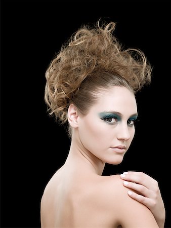 false eyelashes - Portrait of a young woman wearing false eyelashes Stock Photo - Premium Royalty-Free, Code: 614-02343524