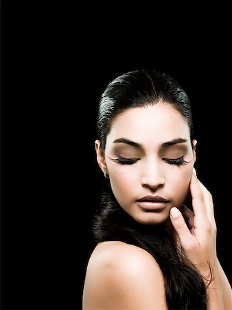 false eyelashes - A young woman Stock Photo - Premium Royalty-Free, Code: 614-02343593