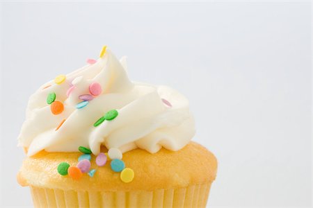 sprinkles - A cup cake Stock Photo - Premium Royalty-Free, Code: 614-02394205