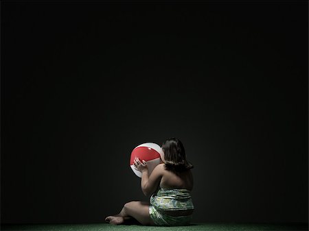 Girl with beach ball Stock Photo - Premium Royalty-Free, Code: 614-02640186