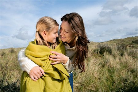 Mother and daughter outdoors with blanket Stock Photo - Premium Royalty-Free, Code: 614-02680507