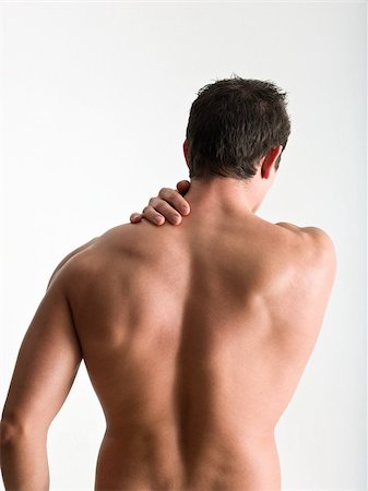 shoulder pain - Rear view of nude man Stock Photo - Premium Royalty-Free, Code: 614-02739503