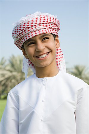 Portrait of a boy wearing a headdress Stock Photo - Premium Royalty-Free, Code: 614-02764047