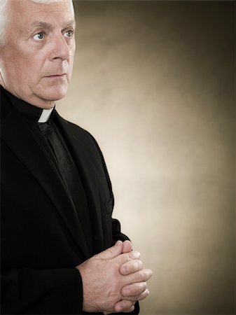 priest - A priest praying Foto de stock - Sin royalties Premium, Código: 614-02764129