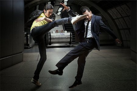 subway station - Two men fighting Stock Photo - Premium Royalty-Free, Code: 614-02763846