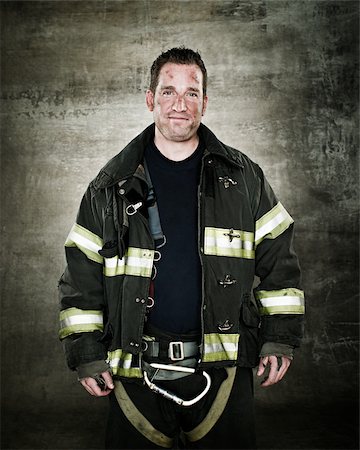 dirty person - Portrait of a firefighter Stock Photo - Premium Royalty-Free, Code: 614-02763940