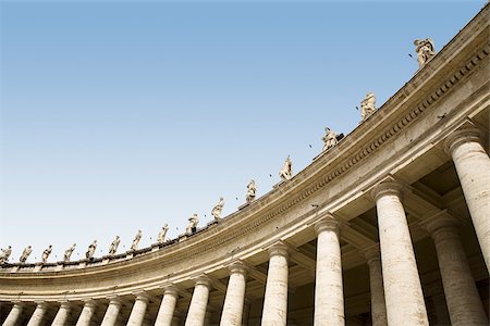 Low angle view of statues in st peters square Stock Photo - Premium Royalty-Free, Code: 614-02838125