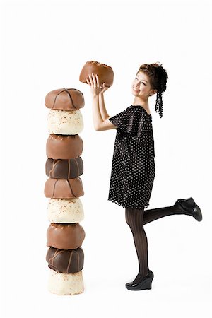 Woman with large chocolates Stock Photo - Premium Royalty-Free, Code: 614-02838648