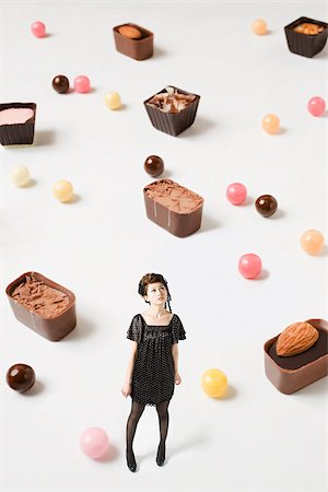 surrealism   woman - Small woman and big candy Stock Photo - Premium Royalty-Free, Code: 614-02838654