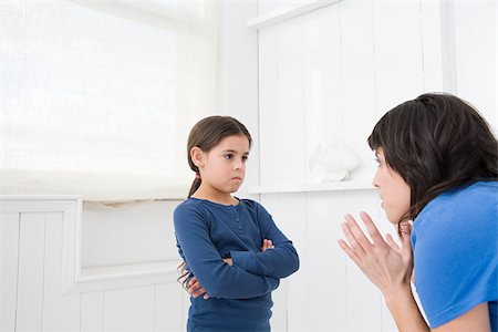 daughter mother strong - Mother disciplining her daughter Stock Photo - Premium Royalty-Free, Code: 614-02934913