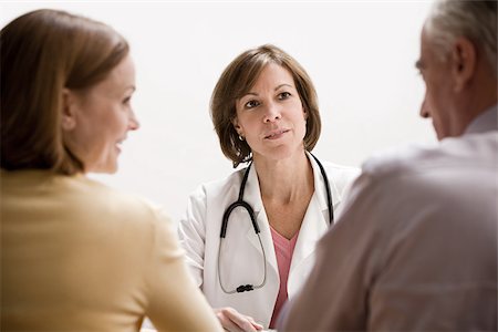 Doctor and patients Stock Photo - Premium Royalty-Free, Code: 614-02984114