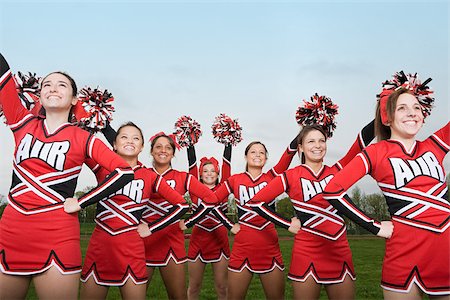 Cheerleaders performing routine Stock Photo - Premium Royalty-Free, Code: 614-02984862