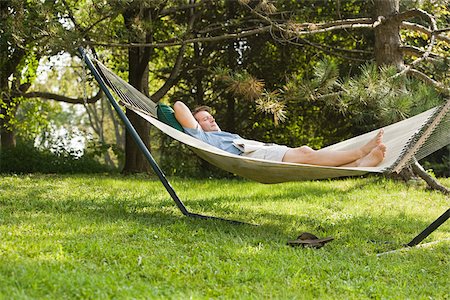 Man in a hammock Stock Photo - Premium Royalty-Free, Code: 614-03191458