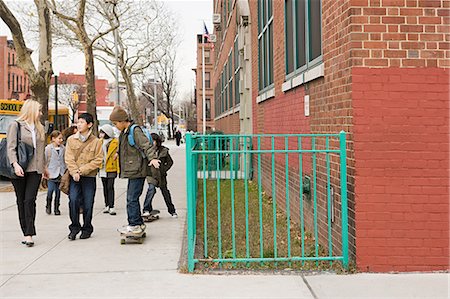 skating in the street - Children walking to school Stock Photo - Premium Royalty-Free, Code: 614-03393663