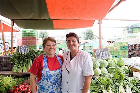 santiago - Two female traders on vegetable stall Stock Photo - Premium Royalty-Free, Code: 614-03393792