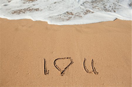 summer text message - I love you written in sand Foto de stock - Sin royalties Premium, Código: 614-03455075