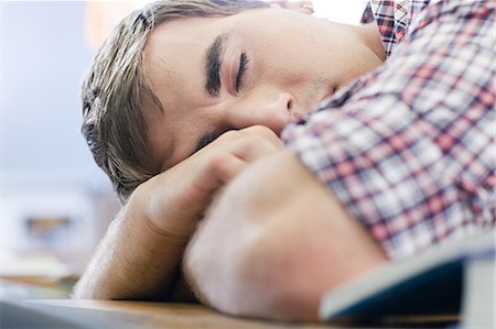 Male high school student asleep in class Stock Photo - Premium Royalty-Free, Code: 614-03551992