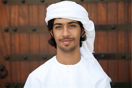 Middle Eastern man wearing headdress, portrait Stock Photo - Premium Royalty-Free, Code: 614-03577118