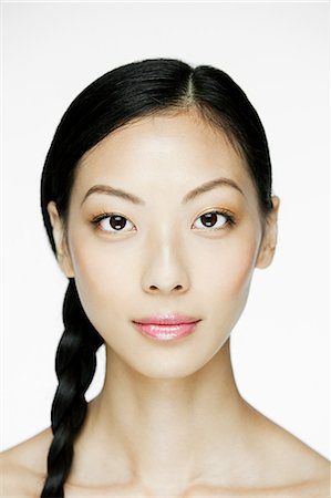 pretty human face frontal view - Portrait of a young chinese woman Stock Photo - Premium Royalty-Free, Code: 614-03649489