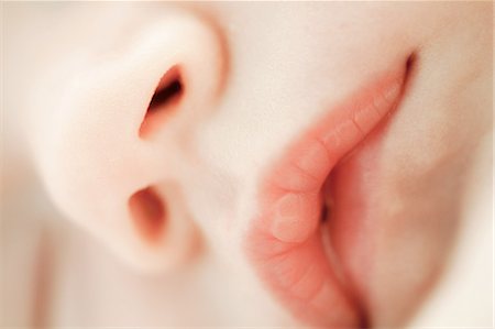 Close up of baby nose and mouth Stock Photo - Premium Royalty-Free, Code: 614-03684102