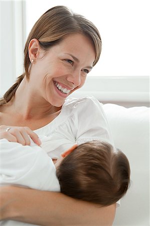 simsearch:614-05955652,k - Happy mother and baby Stock Photo - Premium Royalty-Free, Code: 614-03684158