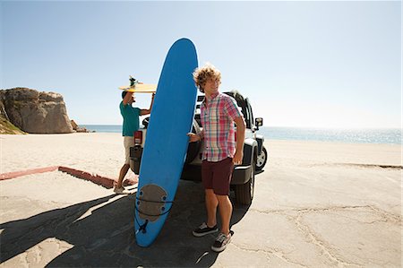 Two young men with surfboards Stock Photo - Premium Royalty-Free, Code: 614-03697649