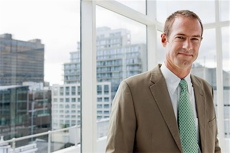 Businessman in office, portrait Stock Photo - Premium Royalty-Free, Code: 614-03981630